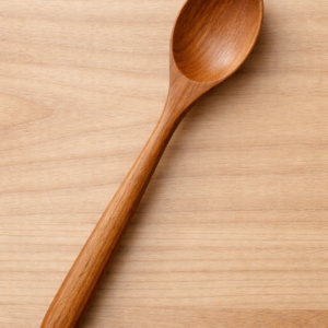 Simple Elegance: Wooden Spoon on Natural Wood